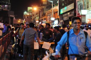 On MG Road The same group of people, now on a crowded street